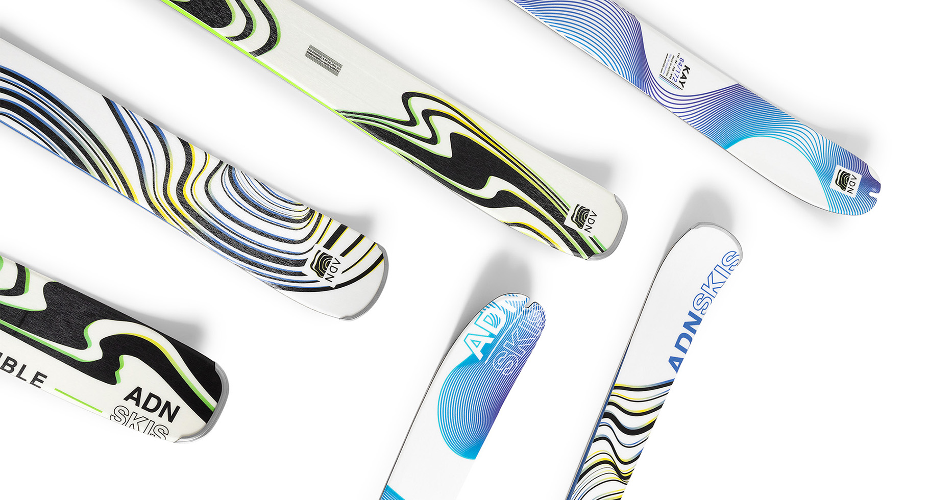 3 pairs of skis on a white background
                